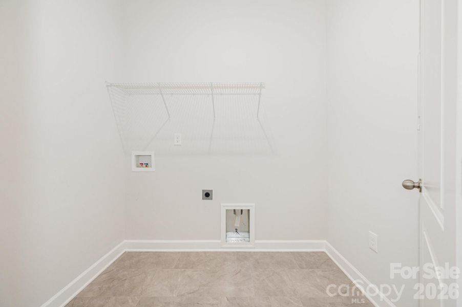 Laundry room right off the 3-car garage entry. Laundry room right off the 3-car garage entry.