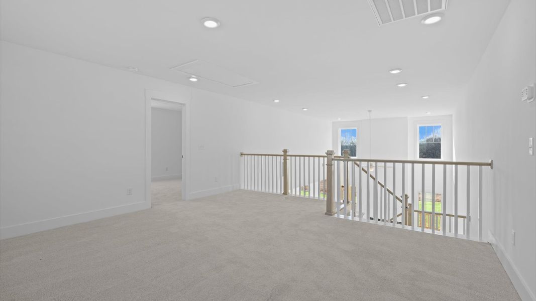 Notable carpeted loft designed with high standards and refined finishes