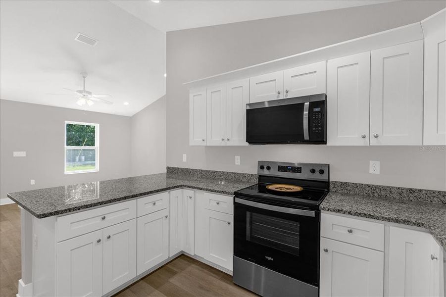 Furnished interior view inside a new home in , Dunnellon (Image 6).