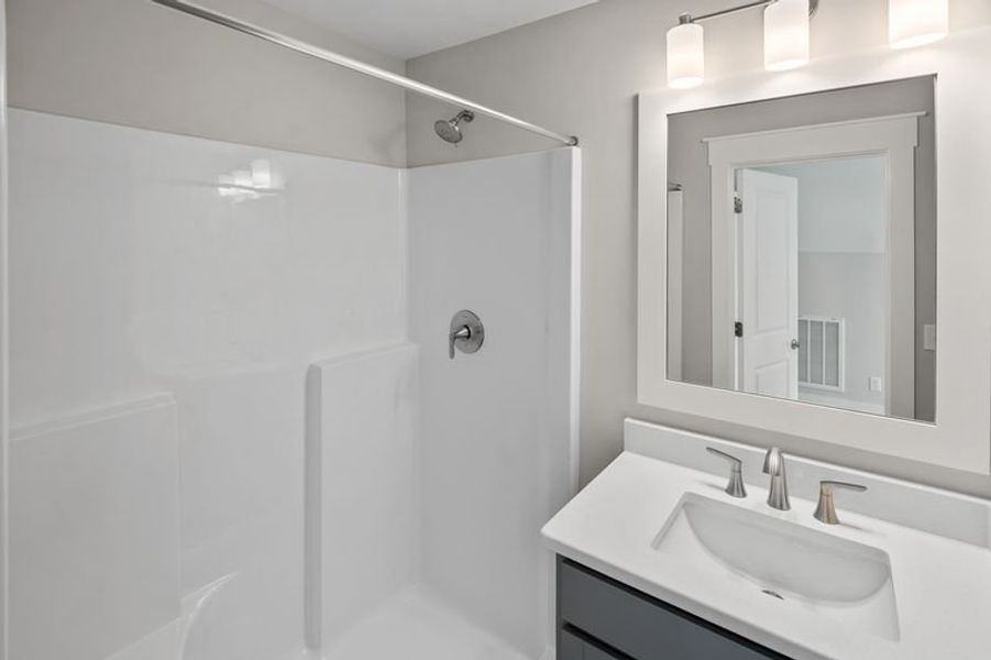 Furnished interior view inside a new home in Riverside Cove, Wilmington (Image 32). Furnished interior view inside a new home in Riverside Cove, Wilmington (Image 32).