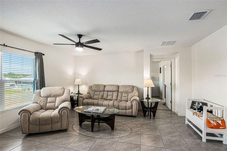 Furnished interior view inside a new home in Fairways at Twisted Oaks, Beverly Hills (Image 6).