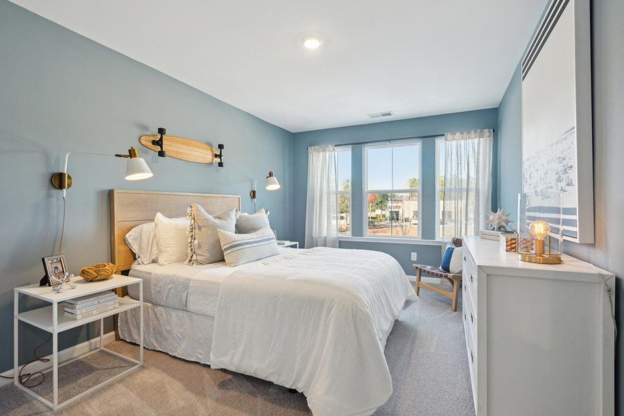 Furnished interior view inside a new home in Lindera Preserve at Cane Bay Plantation: Townhomes, Summerville (Image 2). Furnished interior view inside a new home in Lindera Preserve at Cane Bay Plantation: Townhomes, Summerville (Image 2).