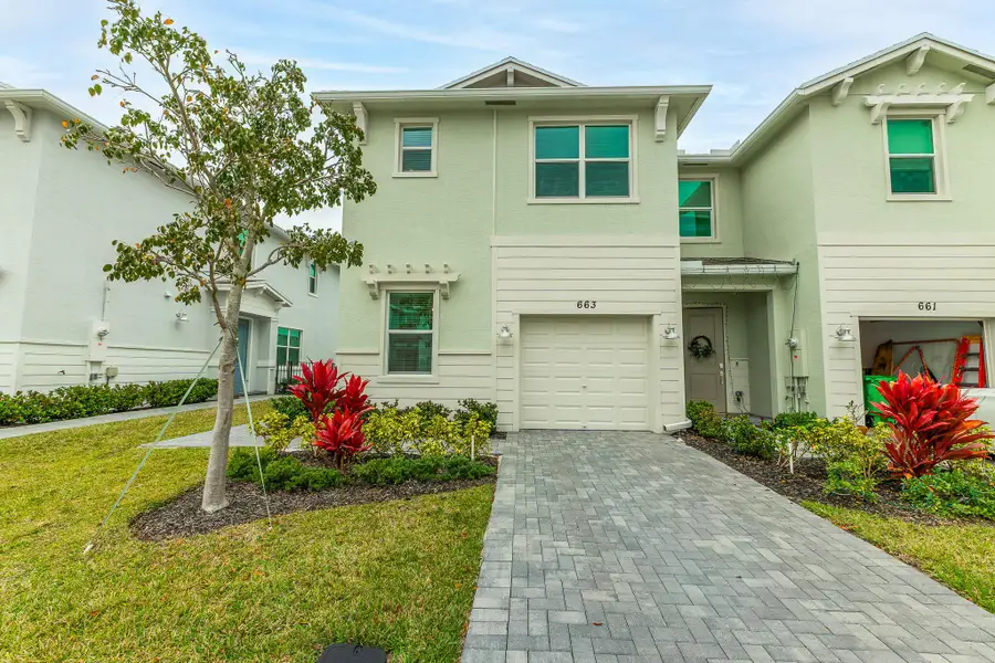 Front exterior of a new home in , Port St. Lucie, FL, highlighting curb appeal (Image 1). Front exterior of a new home in , Port St. Lucie, FL, highlighting curb appeal (Image 1).