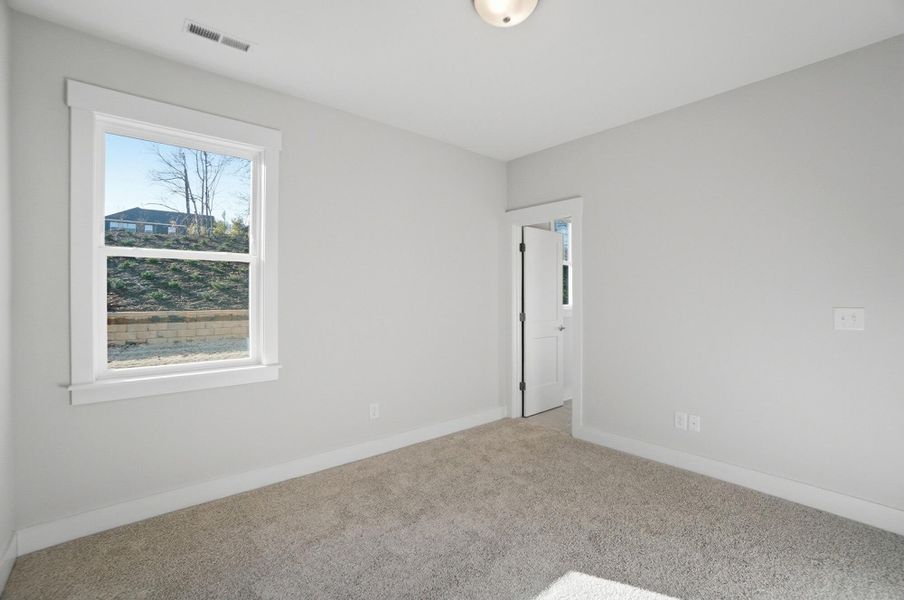 Spacious, unfurnished interior of a new home in Rone Creek, Waxhaw (Image 31).