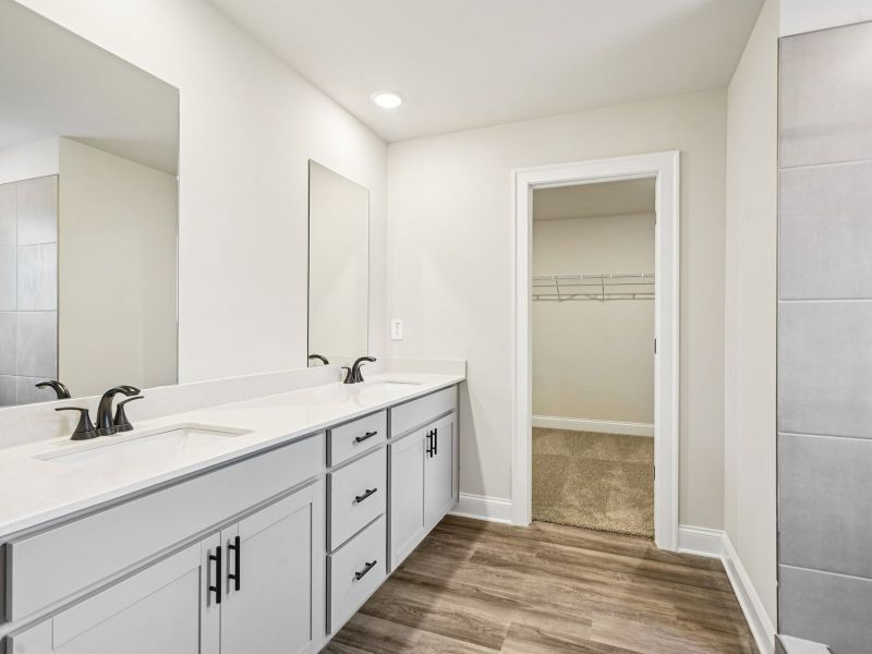 Furnished interior view inside a new home in Martin Springs - Estate Series, Lawrenceville (Image 7).