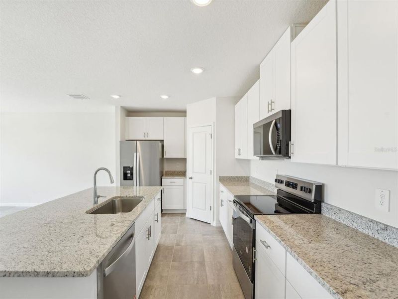 Furnished interior view inside a new home in Benton Hills - Classic Series, Brooksville (Image 14).