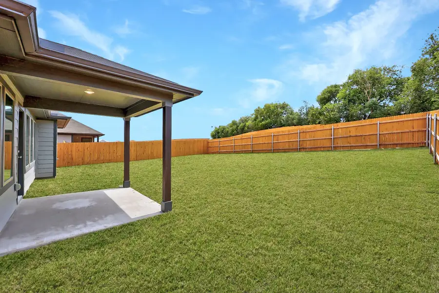 Covered Patio on the Colorado home plan by Trophy Signature Homes – REPRESENTATIVE PHOTO Covered Patio on the Colorado home plan by Trophy Signature Homes – REPRESENTATIVE PHOTO