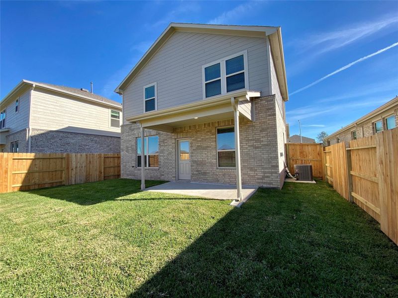 Exterior details and patio area of a home in , Cypress (Image 3).