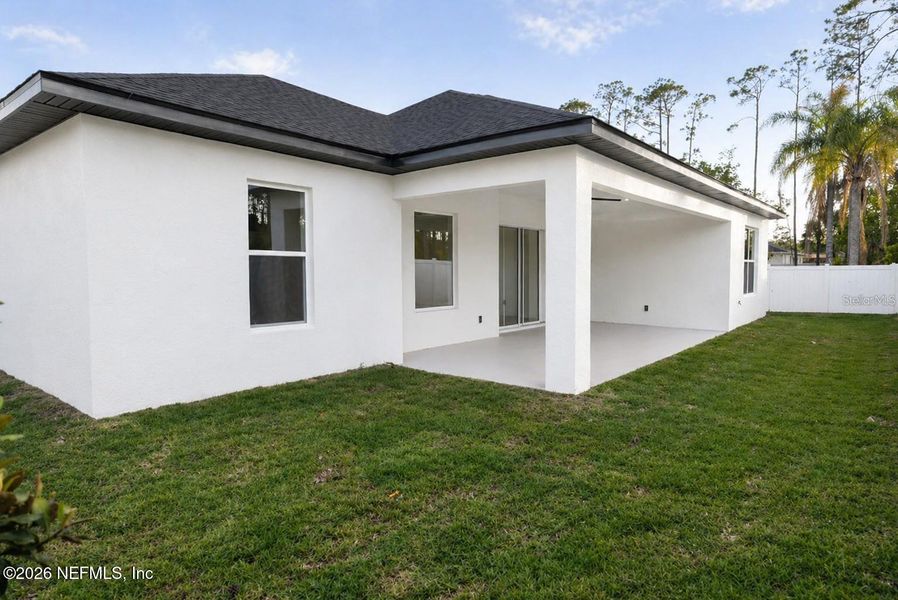 Exterior details and patio area of a home in , Palm Coast (Image 2). Exterior details and patio area of a home in , Palm Coast (Image 2).