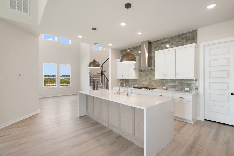 Furnished interior view inside a new home in Wolf Ranch, Georgetown (Image 12).