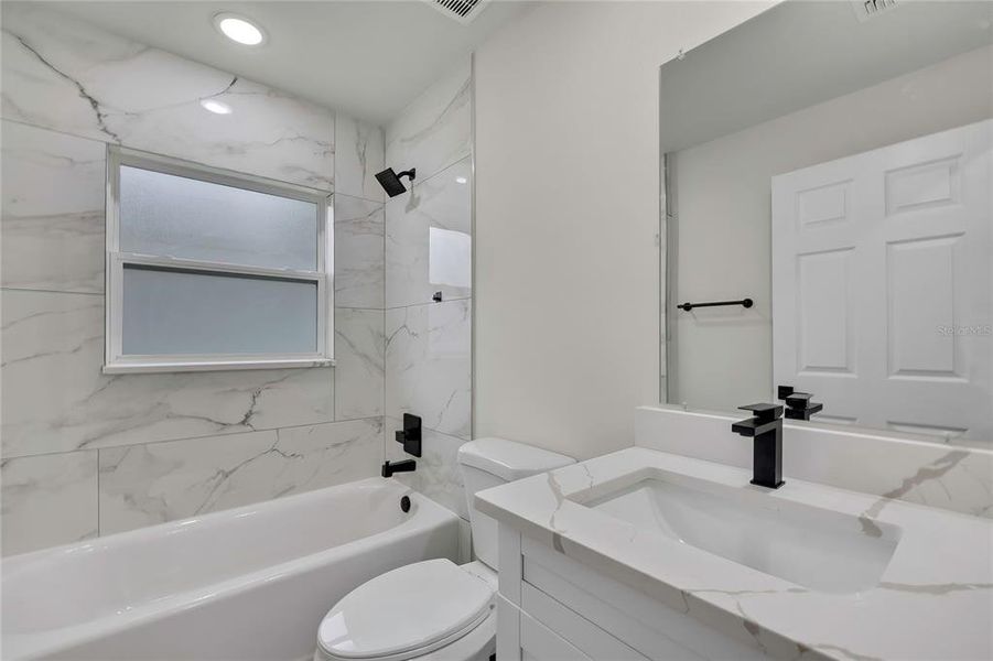 Furnished interior view inside a new home in , Dunnellon (Image 8).