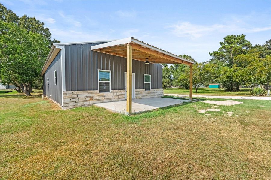 Exterior details and patio area of a home in , Point Blank (Image 18).