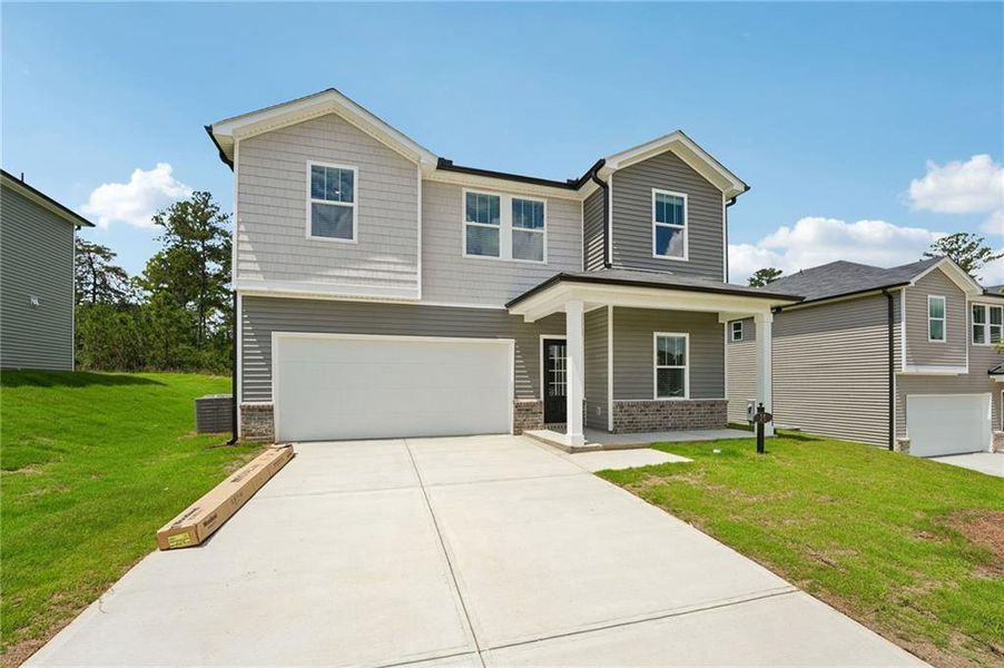 Front exterior of a new home in Manning Mill, Adairsville, GA, highlighting curb appeal (Image 2). Front exterior of a new home in Manning Mill, Adairsville, GA, highlighting curb appeal (Image 2).