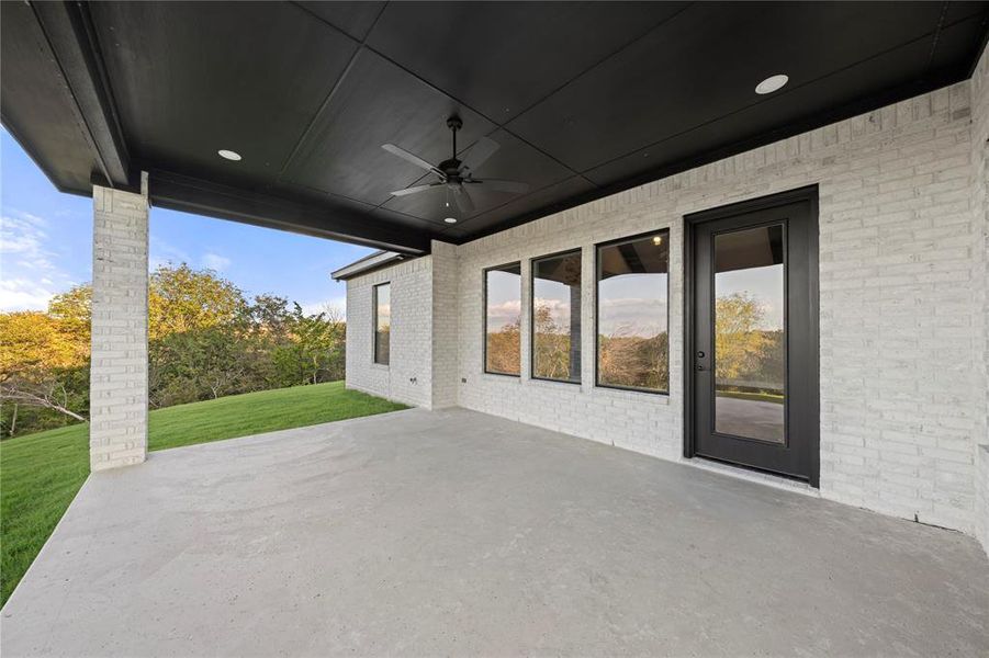 View of patio / terrace with a ceiling fan