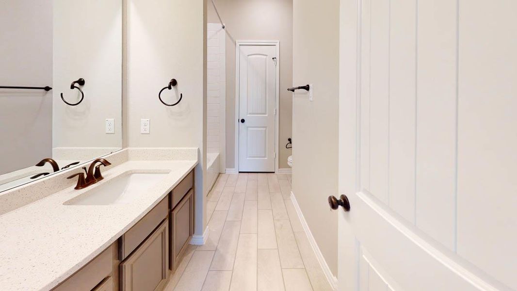 Furnished interior view inside a new home in Sterling Meadows, Salado (Image 13).