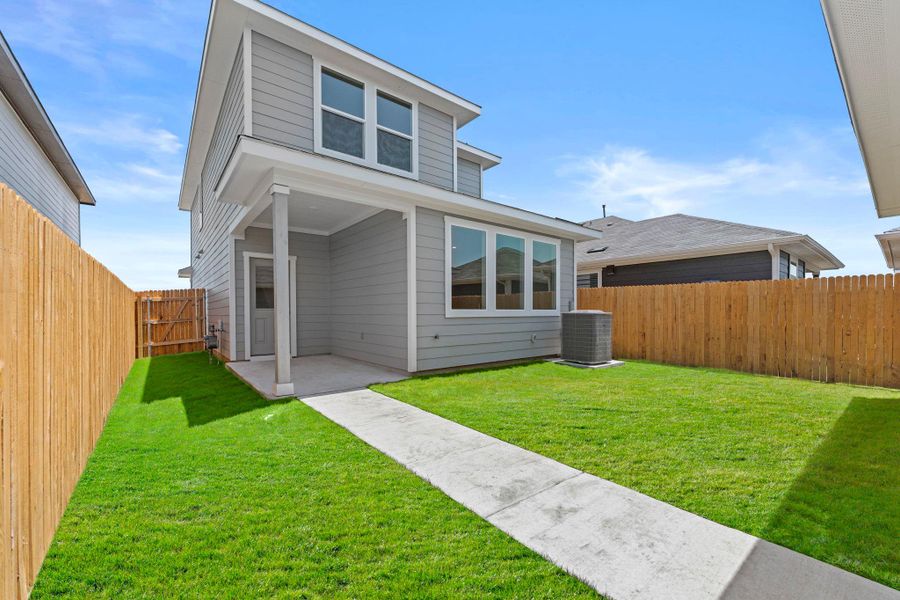 Exterior details and patio area of a home in Valverde, Bastrop (Image 19).