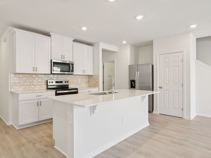 Furnished interior view inside a new home in The Meadow at Crossprairie Townes, St. Cloud (Image 4). Furnished interior view inside a new home in The Meadow at Crossprairie Townes, St. Cloud (Image 4).
