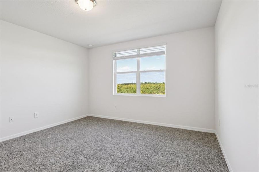 Spacious, unfurnished interior of a new home in Lake Deer Estates - Signature Series, Poinciana (Image 27).