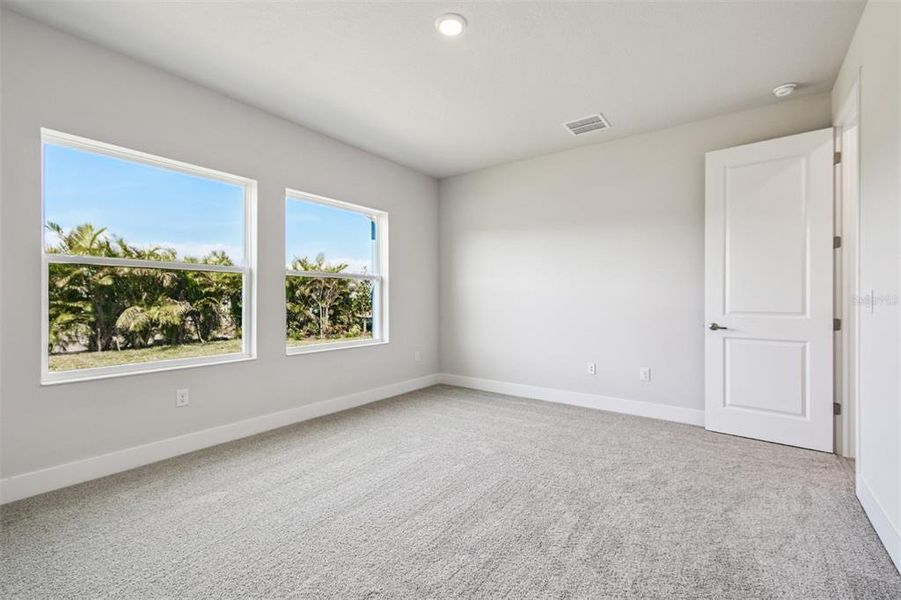 Spacious, unfurnished interior of a new home in Waterset Tradition Series, Apollo Beach (Image 19).