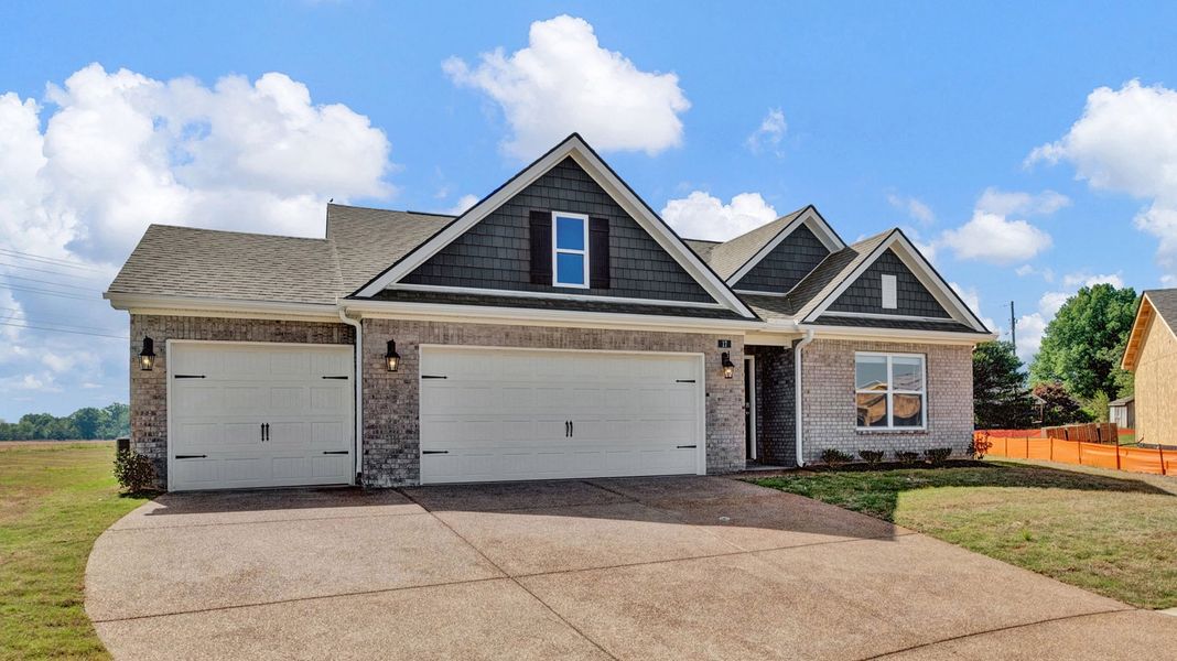 Front exterior of a new home in Hedge Rose, Somerville, TN, highlighting curb appeal (Image 2).