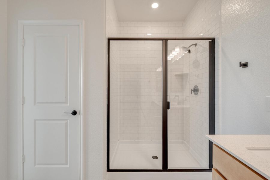 Furnished interior view inside a new home in Mustang Valley, Manor (Image 11).