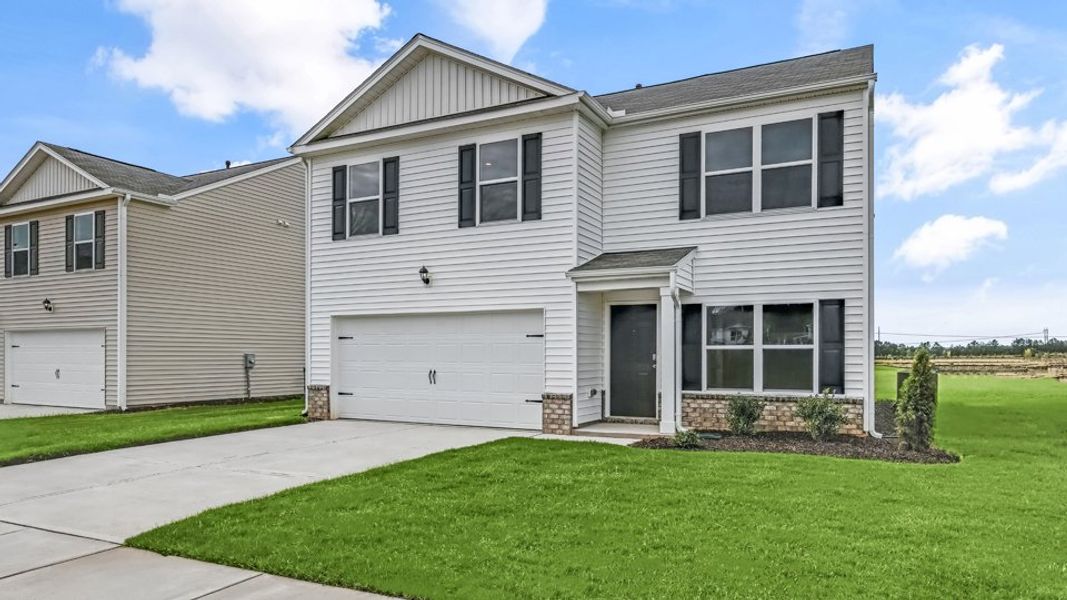 Front exterior of a new home in Wilson's Ridge, Smithfield, NC, highlighting curb appeal (Image 18).