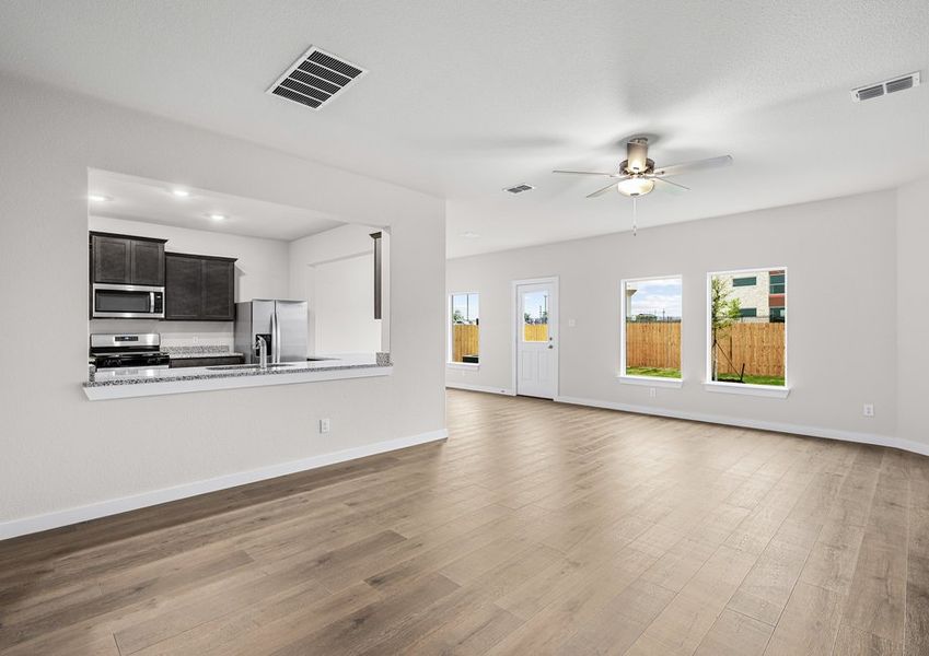 The family room is spacious and has plenty of room for furniture.