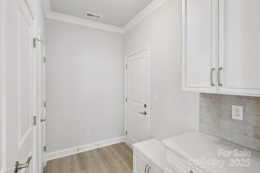 Spacious, unfurnished interior of a new home in Walk23, Huntersville (Image 14).