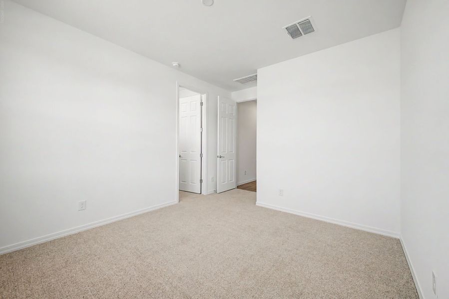 Spacious, unfurnished interior of a new home in White Tank Vistas, Waddell (Image 14). Spacious, unfurnished interior of a new home in White Tank Vistas, Waddell (Image 14).