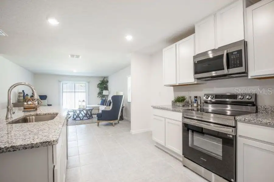 Furnished interior view inside a new home in Royal Highlands, Weeki Wachee (Image 3).