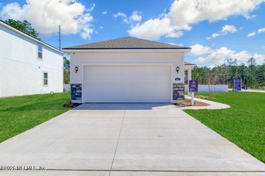 Front exterior of a new home in , Jacksonville, FL, highlighting curb appeal (Image 19).