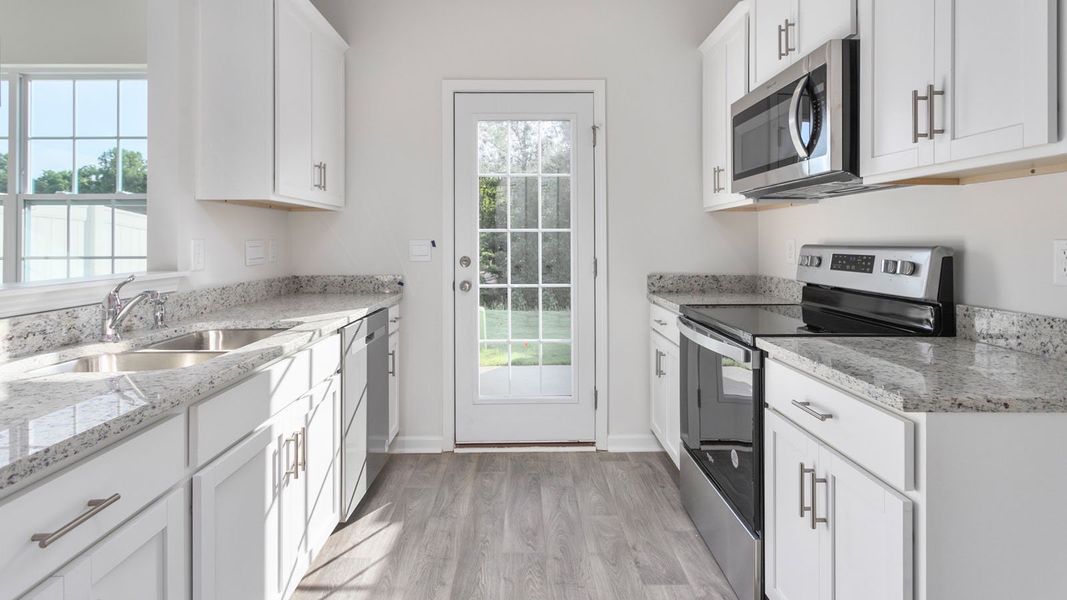 Representative furnished interior of a home built from the NEWTON - EXPRESS by D.R. Horton in Glennview, Kernersville (Image 3).