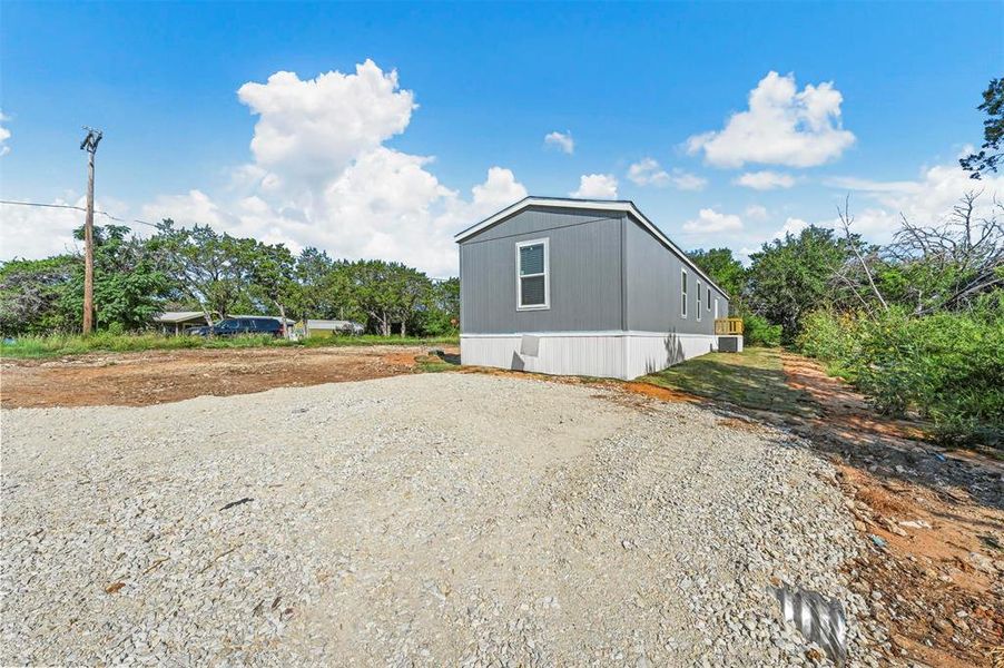 Exterior details and patio area of a home in , Granbury (Image 23).