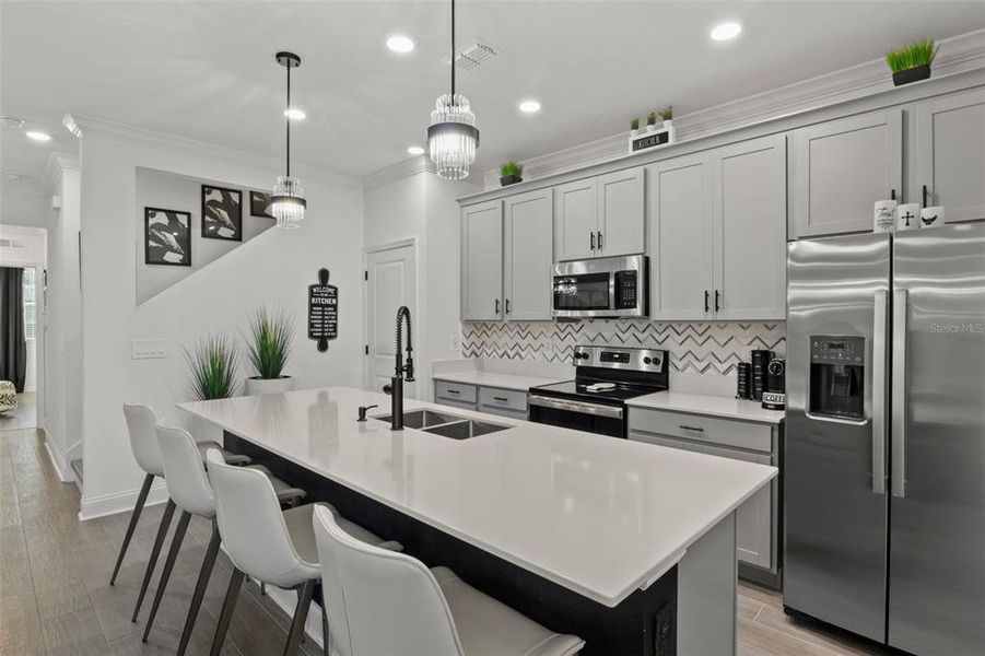 Furnished interior view inside a new home in Tohoqua, Kissimmee (Image 7).