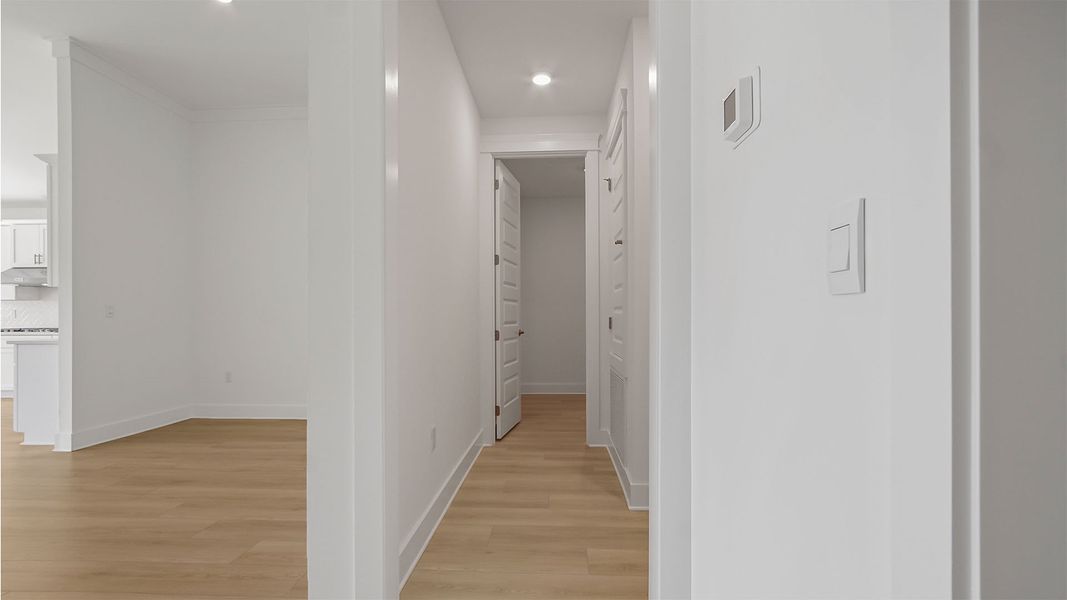Representative unfurnished interior of a home built from the Magnolia by D.R. Horton in Breakfast Point East Phase II, Panama City Beach (Image 35).