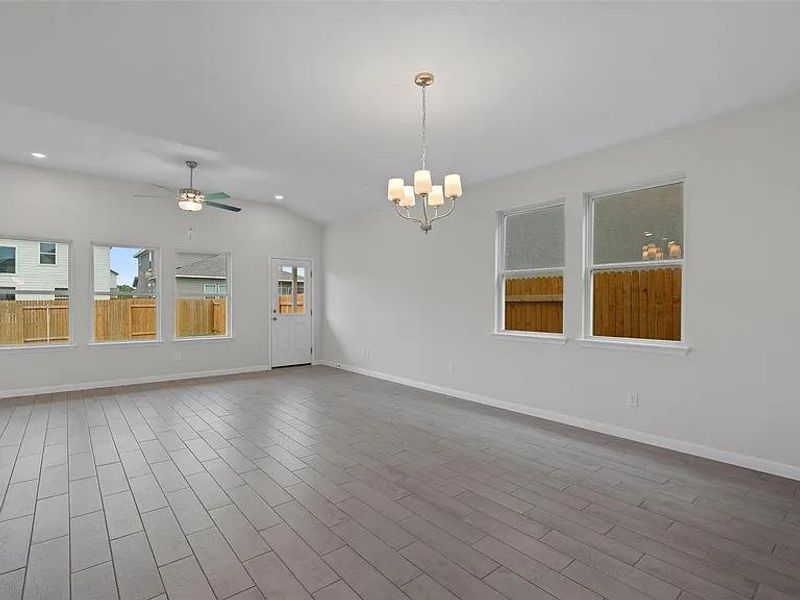 A naturally illuminated living space offers generous dimensions and durable tiled flooring.