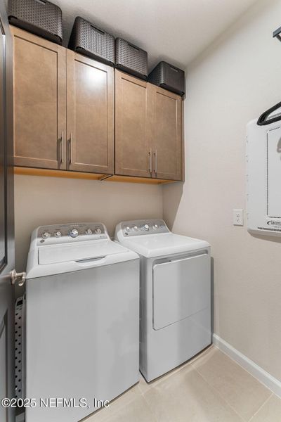 Furnished interior view inside a new home in Seminole Palms Single-Family Homes, Palm Coast (Image 37).