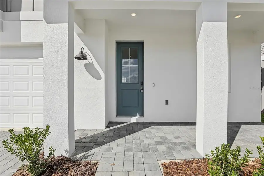 Exterior details and patio area of a home in Cyrene at Minneola, Minneola (Image 4).