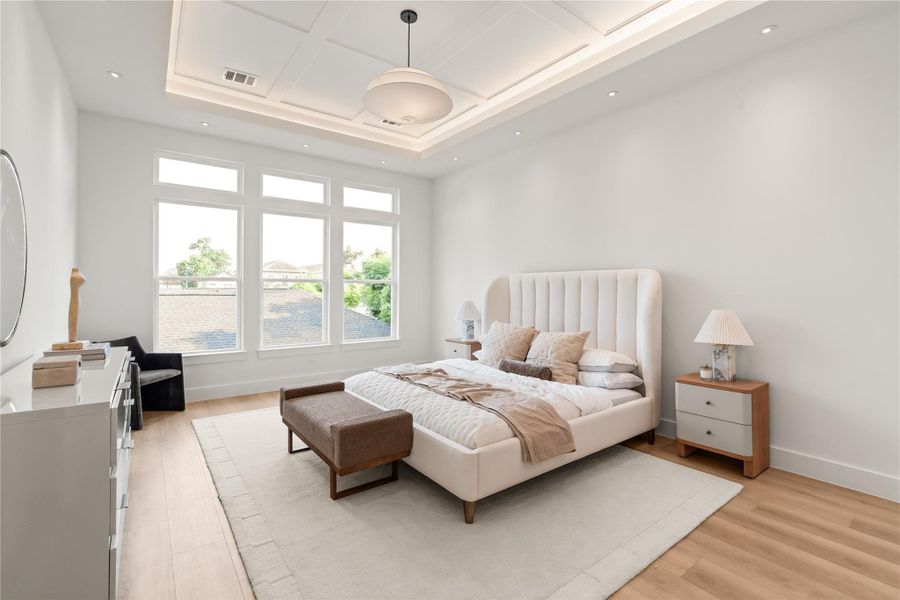 The recessed tray ceiling with hidden LED lighting adds a soft glow that makes this room feel calm no matter the hour. It's a space clearly designed for rest, not just for sleeping.