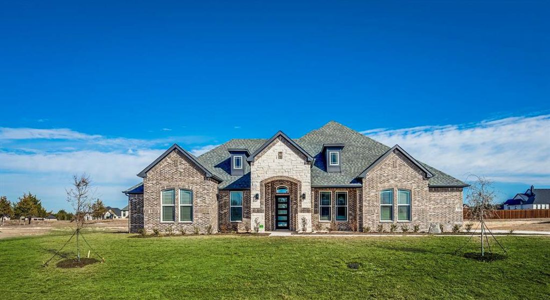 Front exterior of a new home in The Arbors Midlothian, Midlothian, TX, highlighting curb appeal (Image 26).