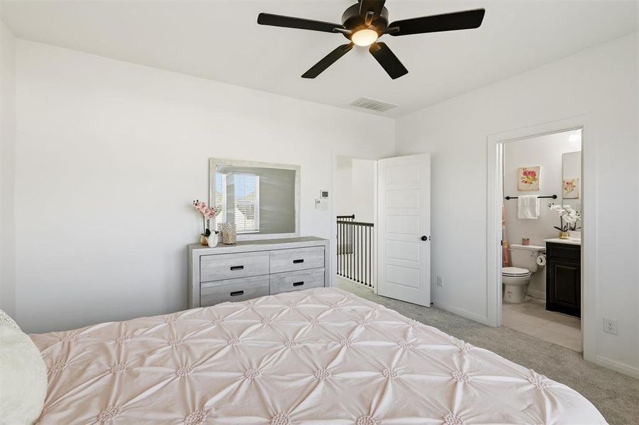Furnished interior view inside a new home in Pecan Square - Gardens, Northlake (Image 27). Furnished interior view inside a new home in Pecan Square - Gardens, Northlake (Image 27).