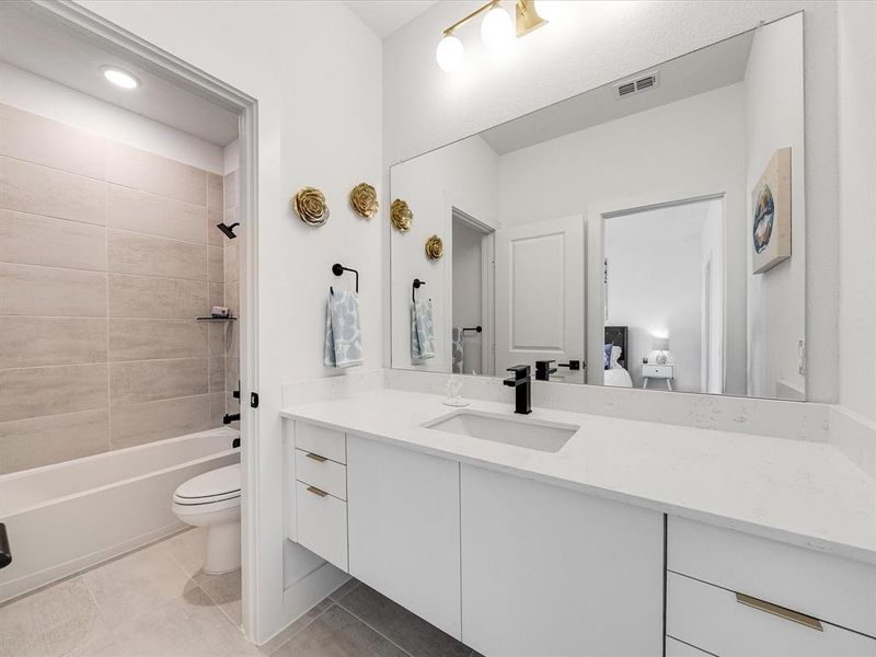 Furnished interior view inside a new home in Royal Court, Little Elm (Image 33).