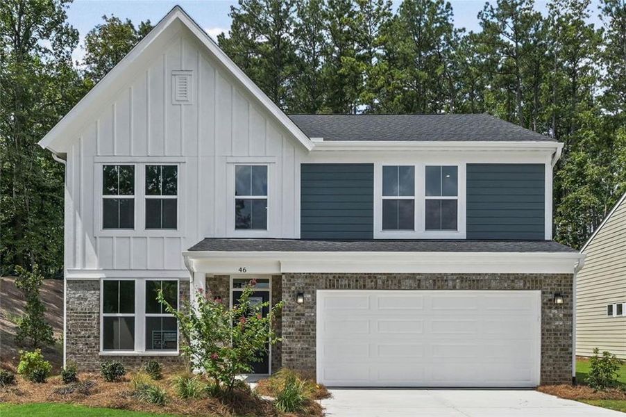 Front exterior of a new home in Easton Park, Dallas, GA, highlighting curb appeal (Image 2). Front exterior of a new home in Easton Park, Dallas, GA, highlighting curb appeal (Image 2).