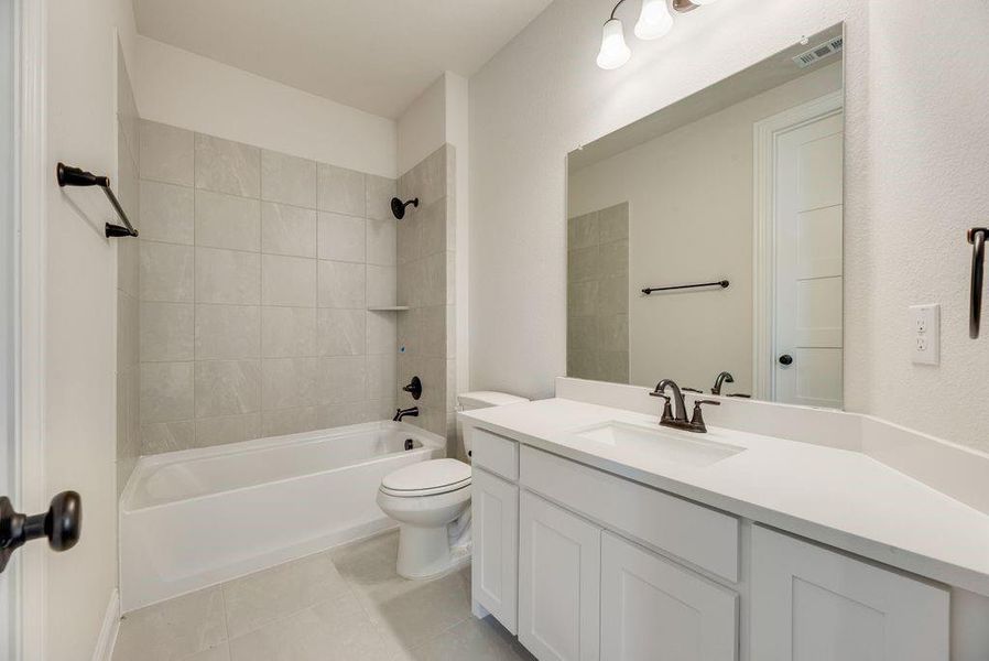 Furnished interior view inside a new home in Dominion of Pleasant Valley, Wylie (Image 7).