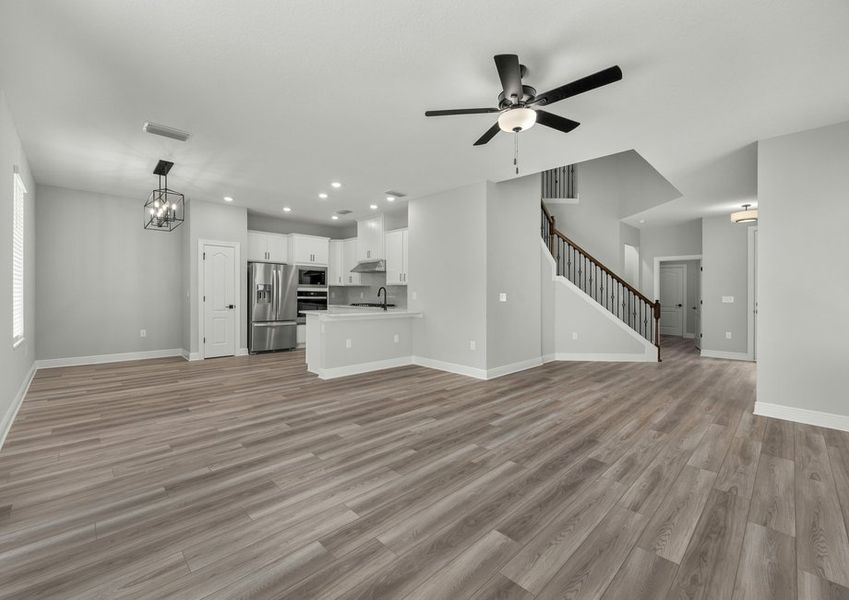 Spacious family room and adjoining dining room and kitchen