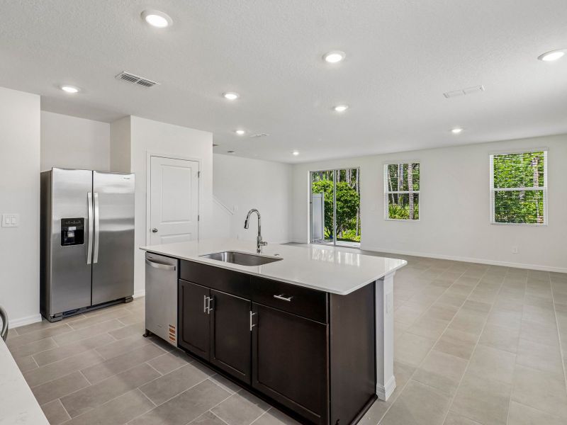 Furnished interior view inside a new home in Bradford Park, Ormond Beach (Image 4).