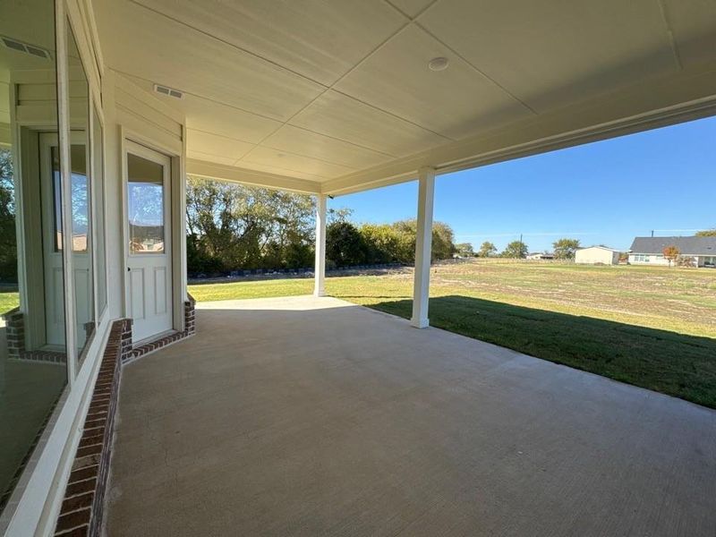 Exterior details and patio area of a home in Nash Estates, Tom Bean (Image 2). Exterior details and patio area of a home in Nash Estates, Tom Bean (Image 2).