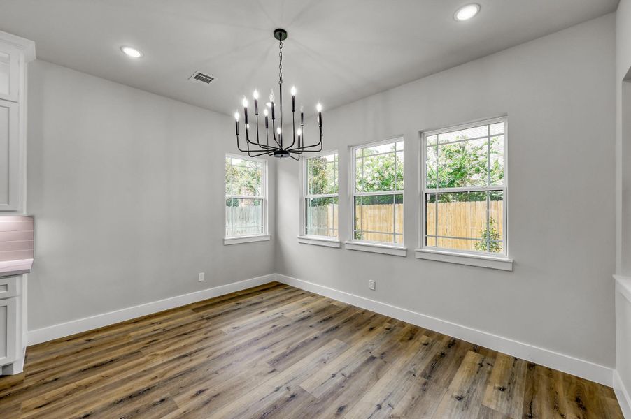 The dining room is conveniently located off the kitchen, perfect for hosting guests. The dining room is conveniently located off the kitchen, perfect for hosting guests.