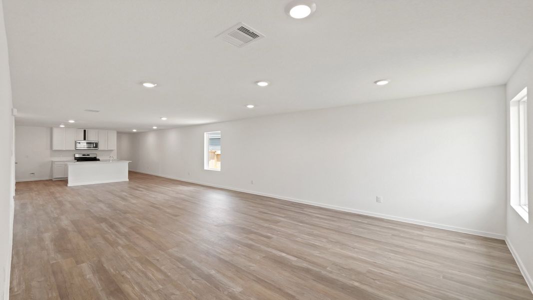 Representative unfurnished interior of a home built from the Estero by D.R. Horton in Lake Conroe Cove, Willis (Image 13). Representative unfurnished interior of a home built from the Estero by D.R. Horton in Lake Conroe Cove, Willis (Image 13).