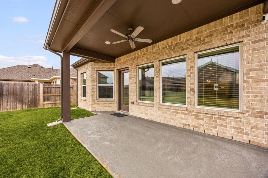 Exterior details and patio area of a home in Marvida, Cypress (Image 23).